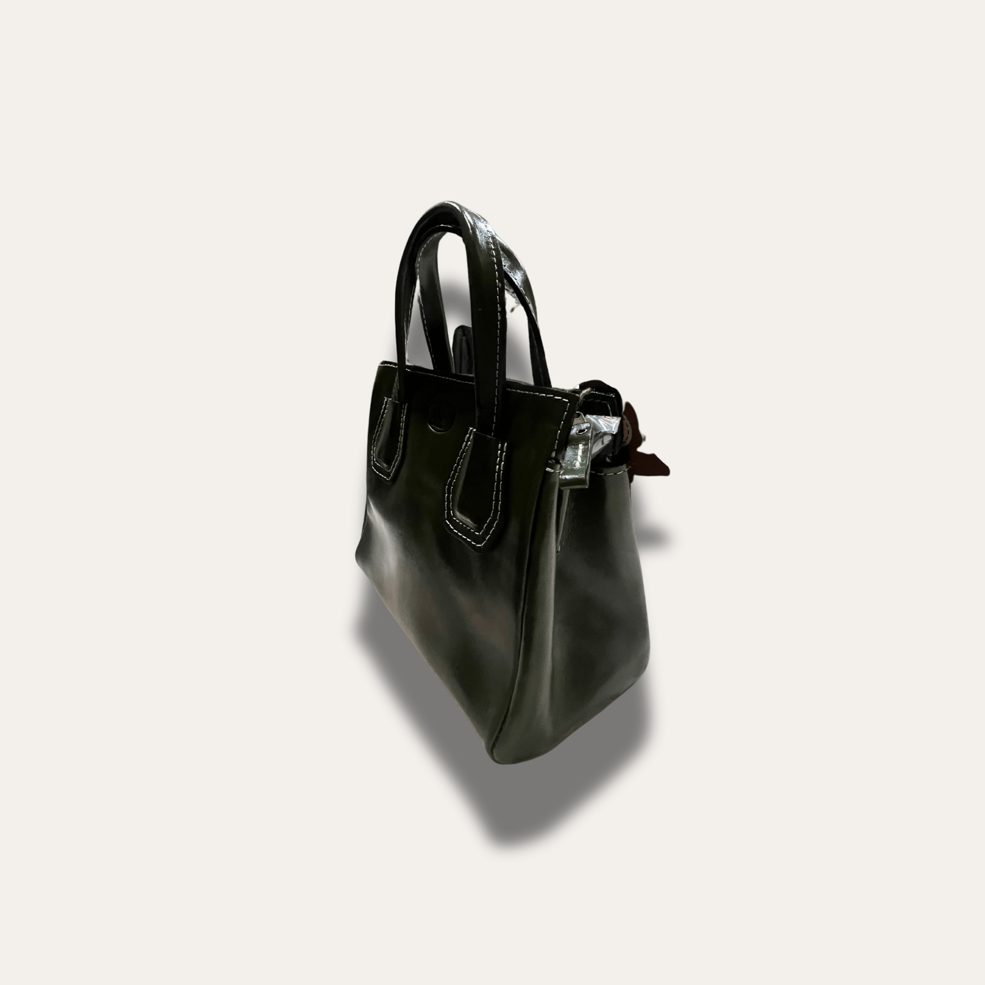 Dimitra Black leather handbag, handcrafted since 1918, showcasing elegant design and premium craftsmanship.