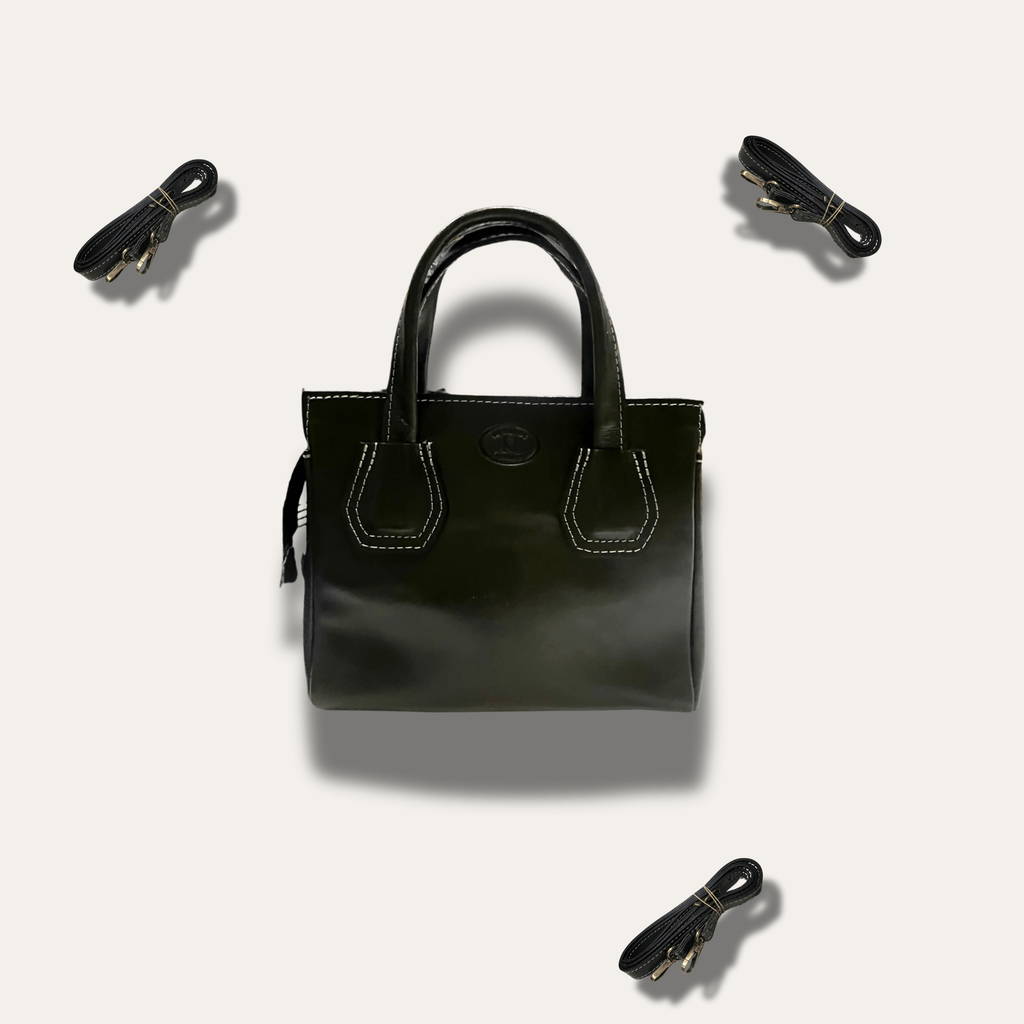 Dimitra Black leather handbag, handcrafted since 1918, featuring elegant design and additional straps for versatility.
