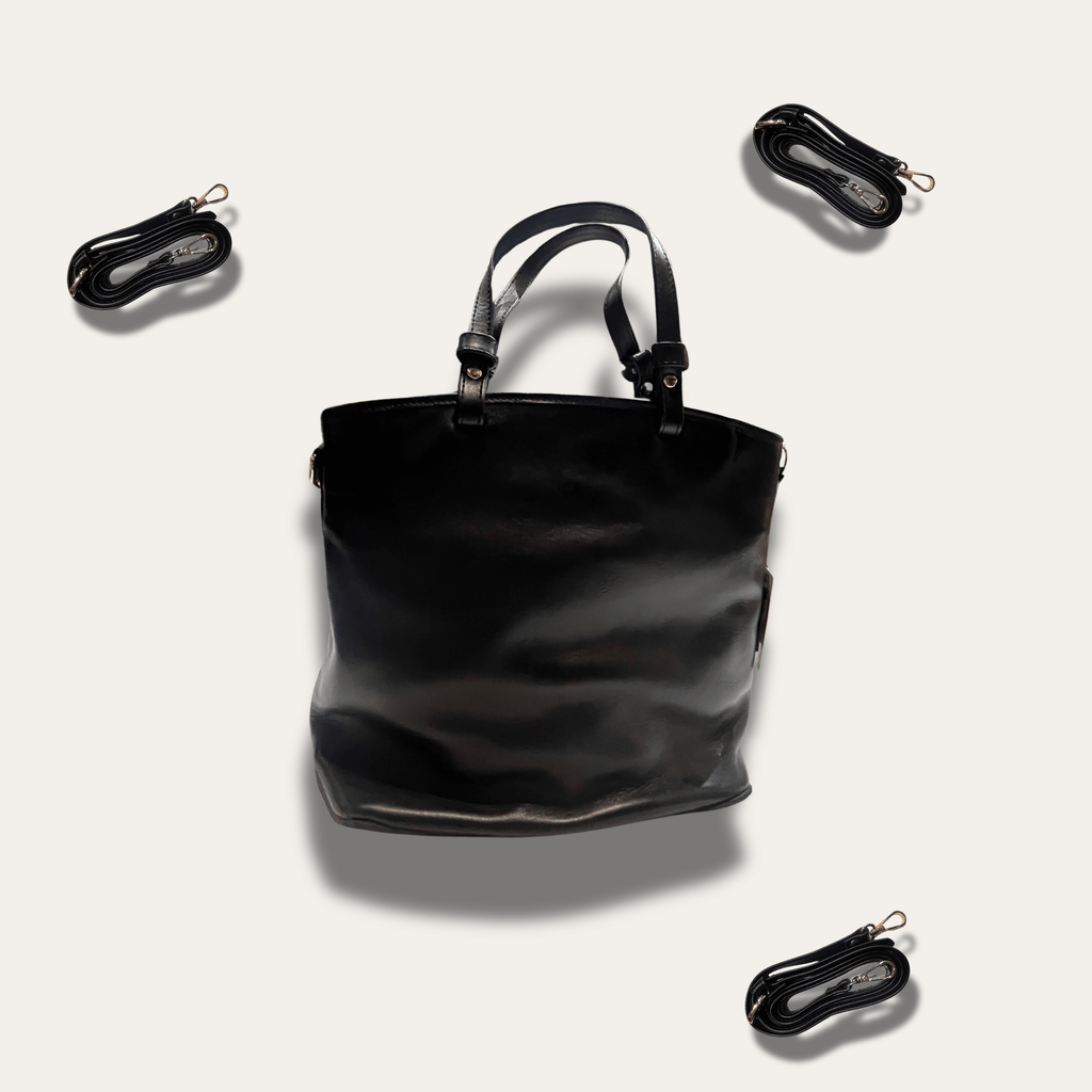 Kalliopi Black leather bag, handcrafted since 1918, stylish design with versatile straps.